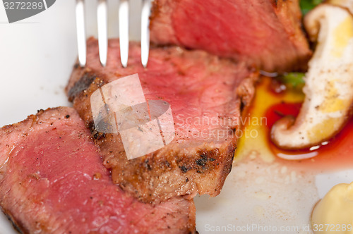 Image of beef filet mignon grilled with vegetables