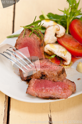 Image of beef filet mignon grilled with vegetables