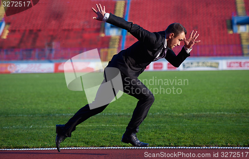 Image of business man ready to sprint