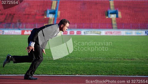 Image of business man ready to sprint