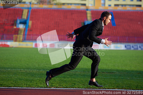 Image of business man ready to sprint