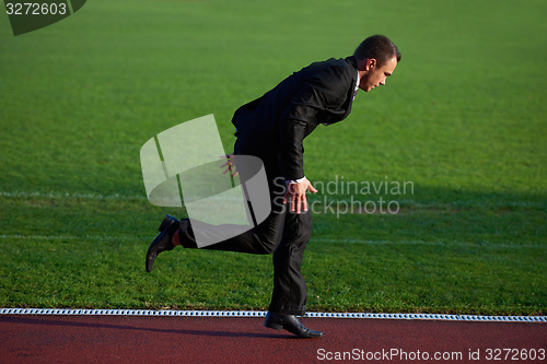 Image of business man ready to sprint