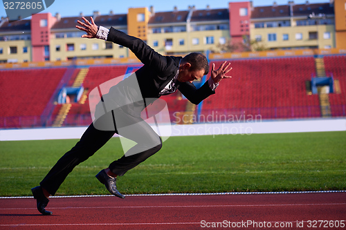 Image of business man ready to sprint