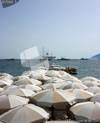 Image of Dense beach umbrellas