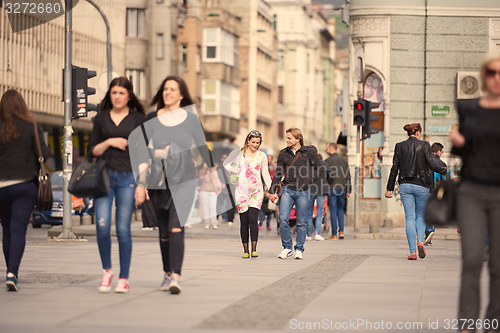 Image of young pregnant couple have fun and relax