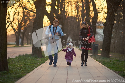 Image of young pregnant couple have fun and relax
