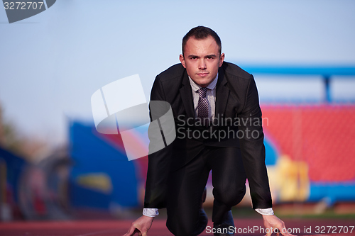 Image of business man ready to sprint