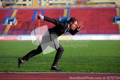 Image of business man ready to sprint