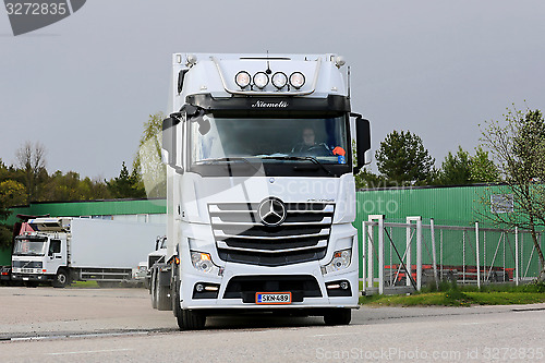 Image of Mercedes-Benz Actros exits Truck Depot