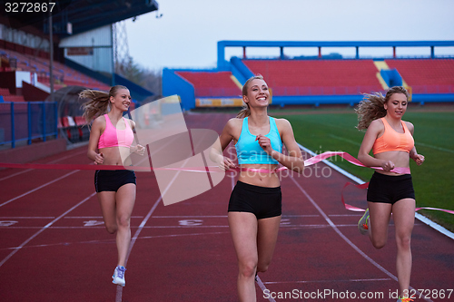 Image of Female Runners Finishing Race Together