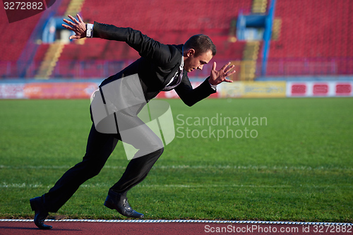 Image of business man ready to sprint