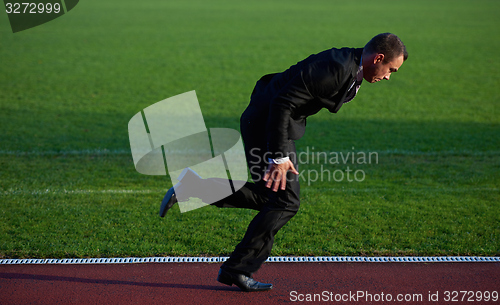 Image of business man ready to sprint