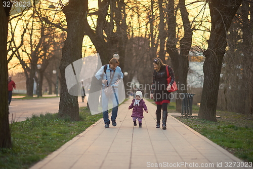 Image of young pregnant couple have fun and relax