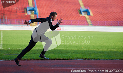 Image of business man ready to sprint