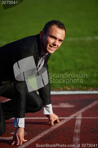 Image of business man ready to sprint