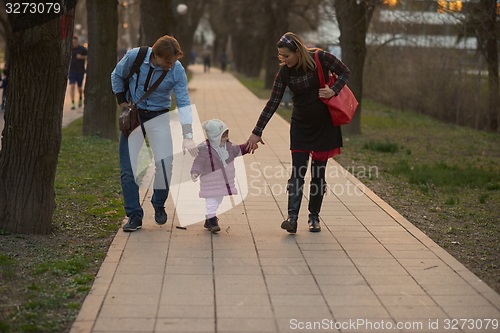 Image of young pregnant couple have fun and relax