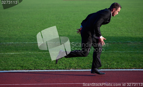 Image of business man ready to sprint