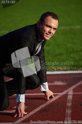 Image of business man ready to sprint