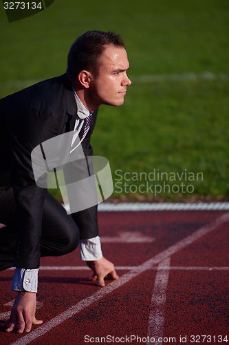 Image of business man ready to sprint