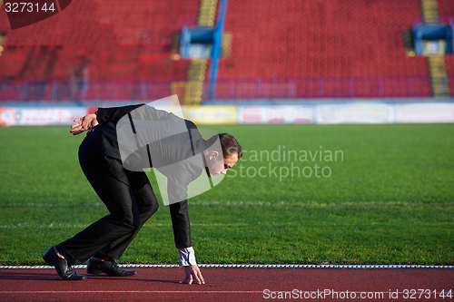 Image of business man ready to sprint