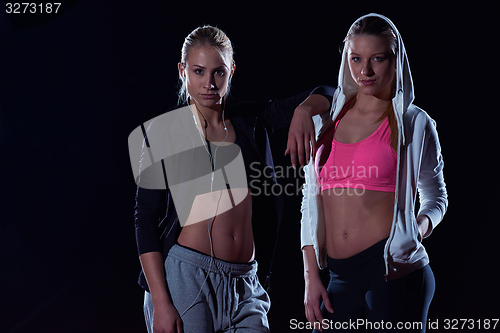 Image of sporty woman on athletic race track