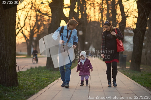 Image of young pregnant couple have fun and relax
