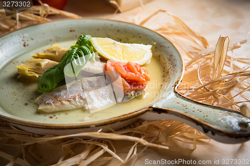 Image of Fish fillet with vegetables