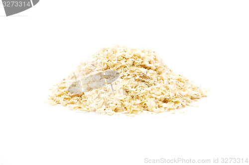 Image of Millet flakes on white