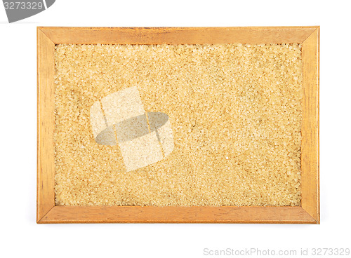 Image of Brown cane sugar in frame