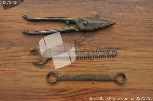 Image of Pair of snips and wrenches