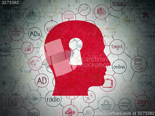 Image of Marketing concept: Head With Keyhole on Digital Paper background