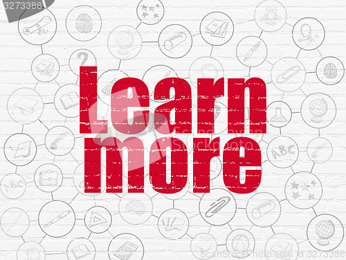 Image of Education concept: Learn More on wall background