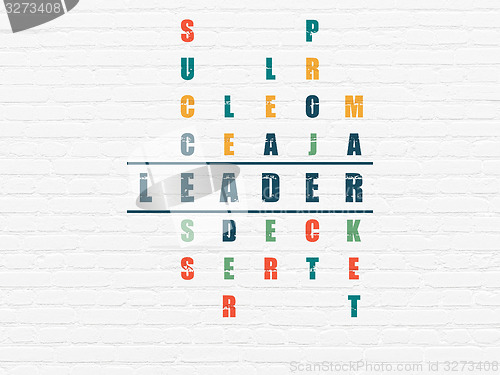 Image of Business concept: word Leader in solving Crossword Puzzle