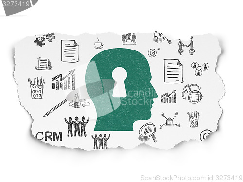 Image of Finance concept: Head With Keyhole on Torn Paper background