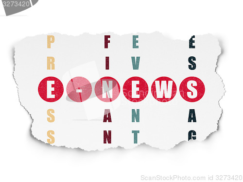 Image of News concept: word E-news in solving Crossword Puzzle