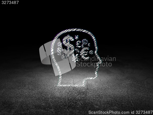 Image of Advertising concept: Head With Finance Symbol in grunge dark room