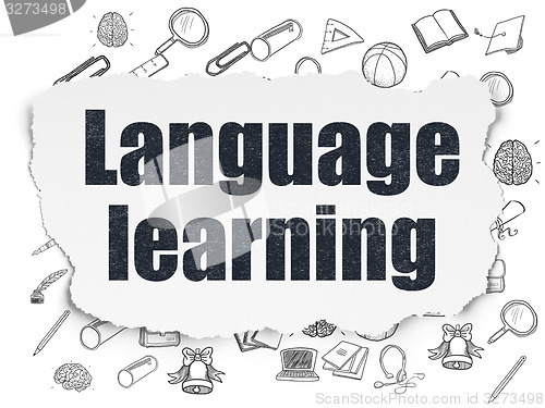 Image of Learning concept: Language Learning on Torn Paper background