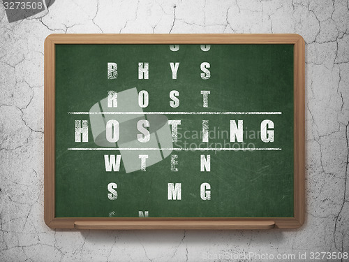 Image of Web design concept: word Hosting in solving Crossword Puzzle
