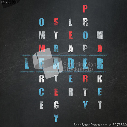 Image of Business concept: word Leader in solving Crossword Puzzle