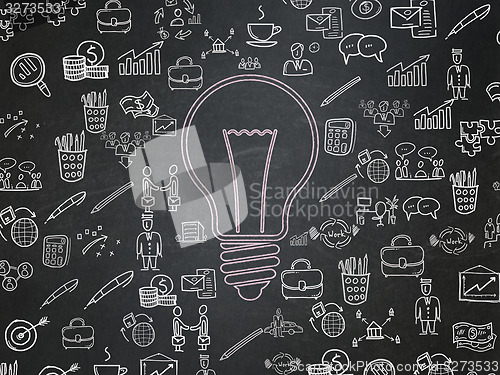 Image of Business concept: Light Bulb on School Board background