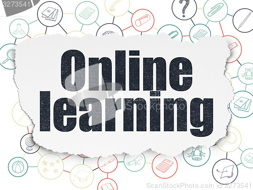 Image of Education concept: Online Learning on Torn Paper background