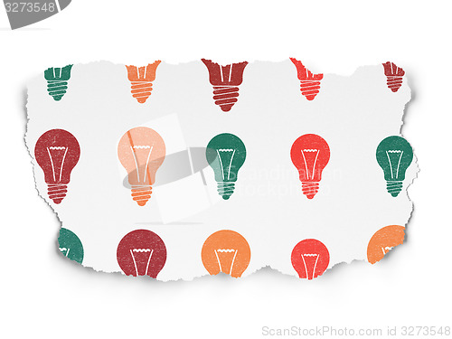Image of Finance concept: Light Bulb icons on Torn Paper background