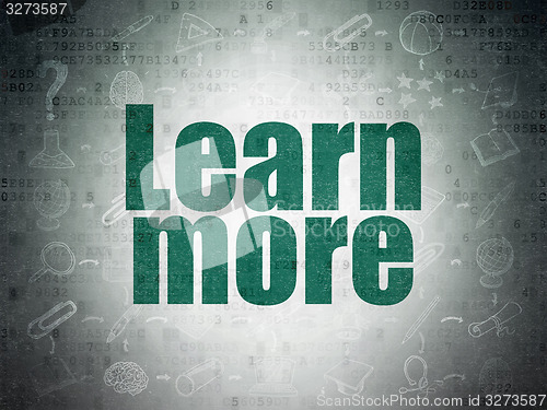 Image of Learning concept: Learn More on Digital Paper background