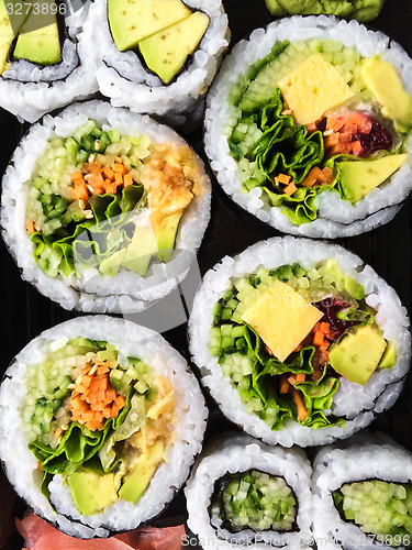 Image of Vegetarian sushi on dark background