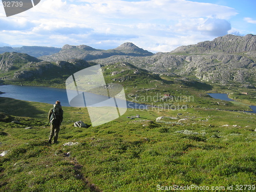 Image of Man hiking in the mountains