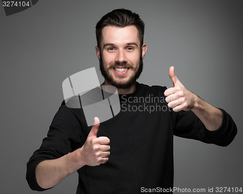 Image of portrait of handsome young smiling man