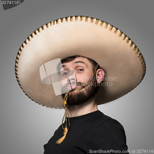 Image of portrait of funny man in Mexican sombrero