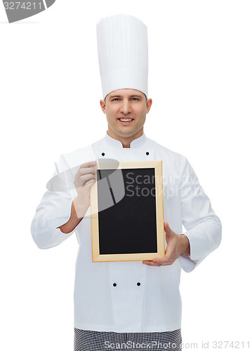 Image of happy male chef cook holding blank menu board