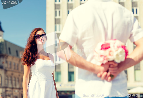 Image of smiling couple in city