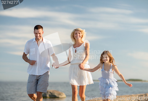 Image of happy family at the seaside